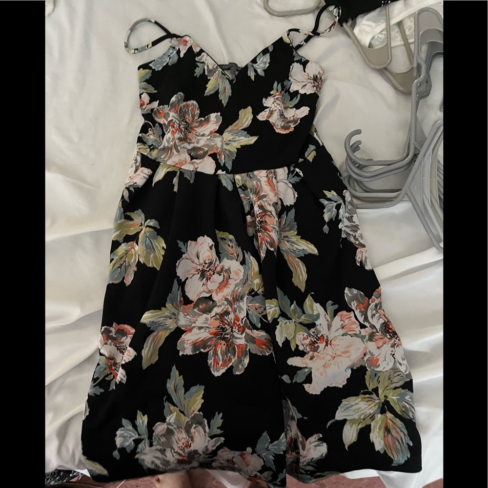 Floral dress. Background is black